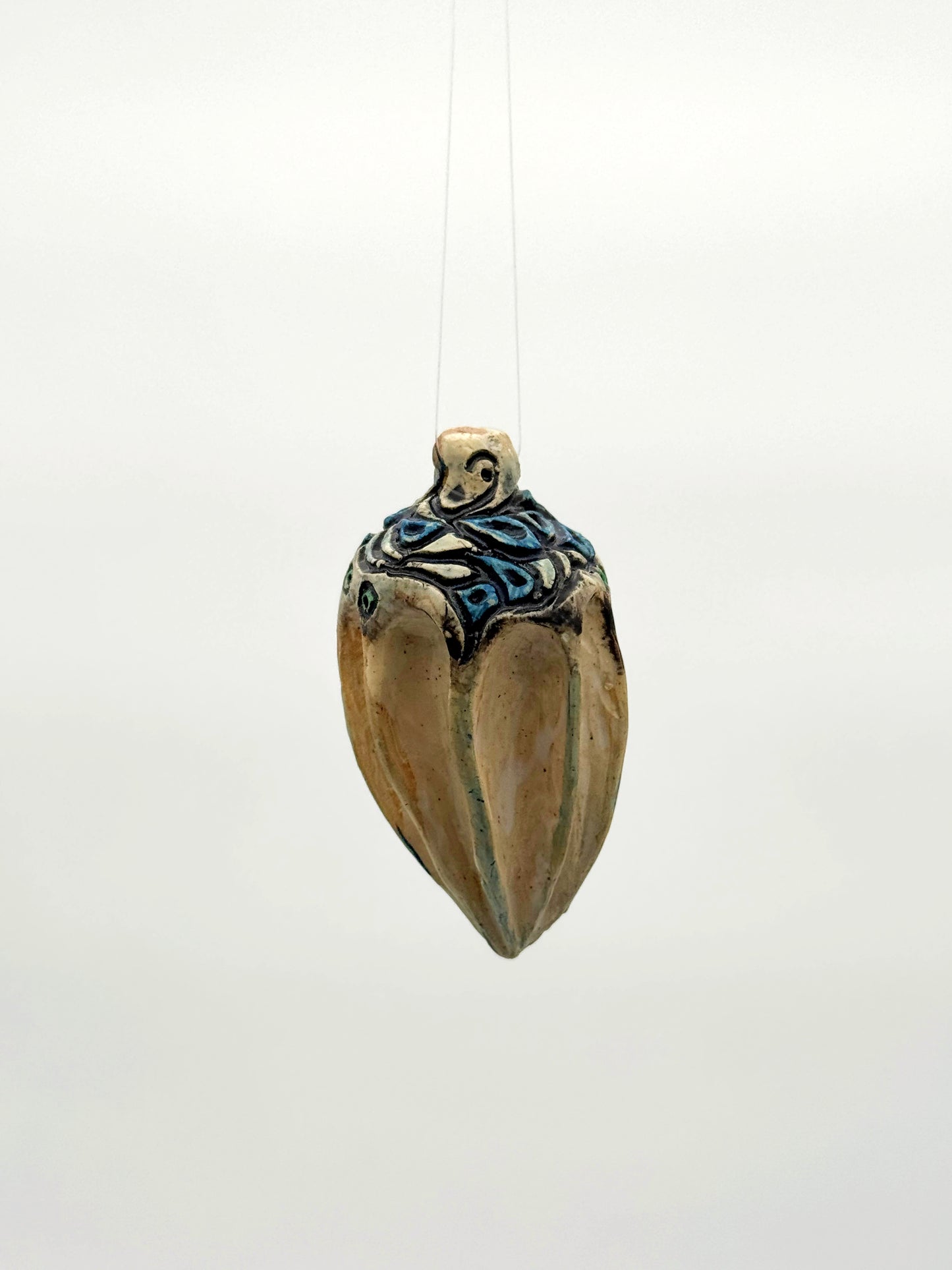 Carved Ornament — Natural, Blue & Black (3")